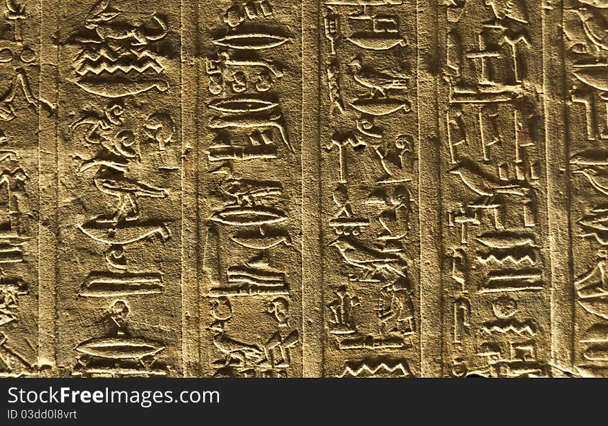 Texture. Detail of some hieroglyphics on the walls of an egyptian temple