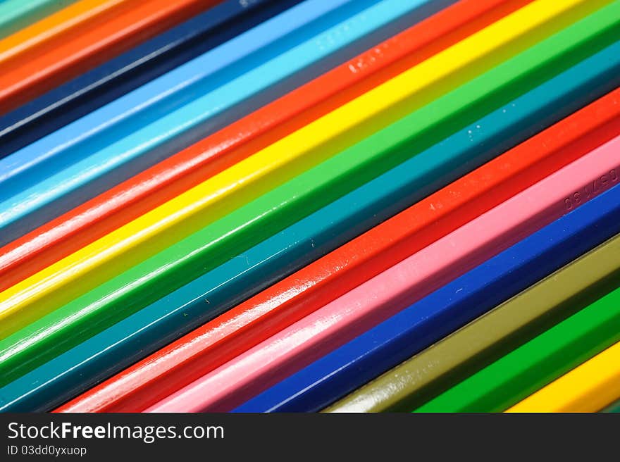 Many colorful school pencils isolated on white background