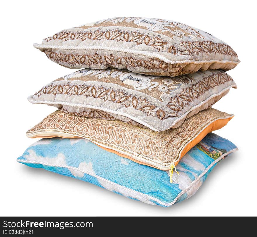 Stack of pillow isolated on white. Clipping path included. Stack of pillow isolated on white. Clipping path included.