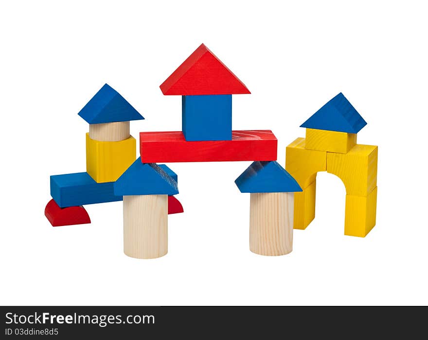 Several houses of wooden blocks on a white background. Several houses of wooden blocks on a white background.