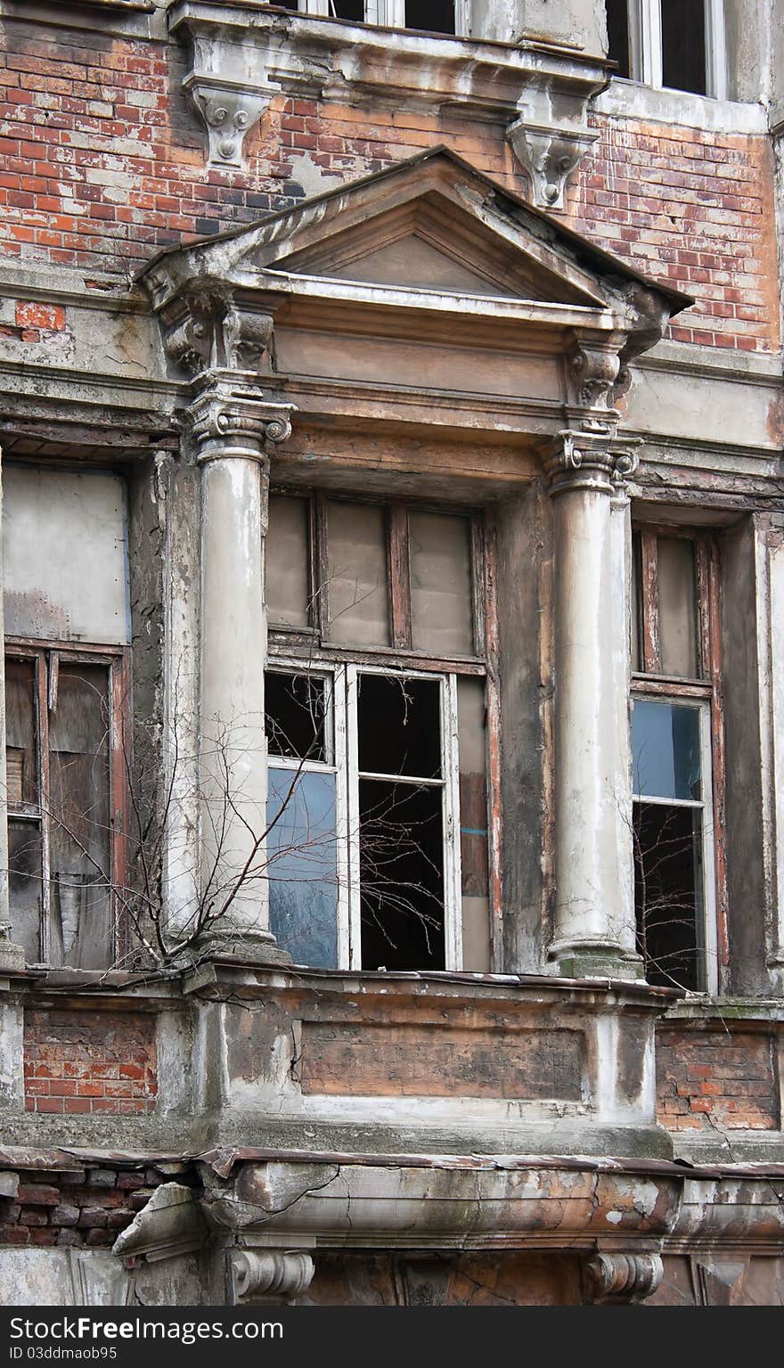 Broken abandoned house in the city. Broken abandoned house in the city