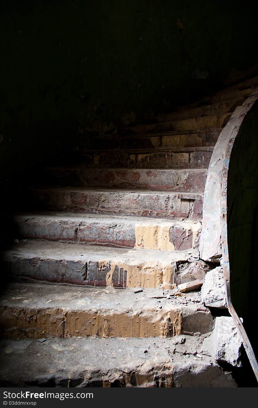 Old broken staircase in the abandoned house