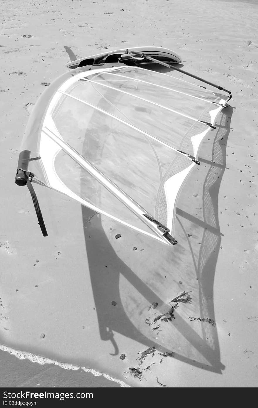 Wind Surfboard Lying On The Beach