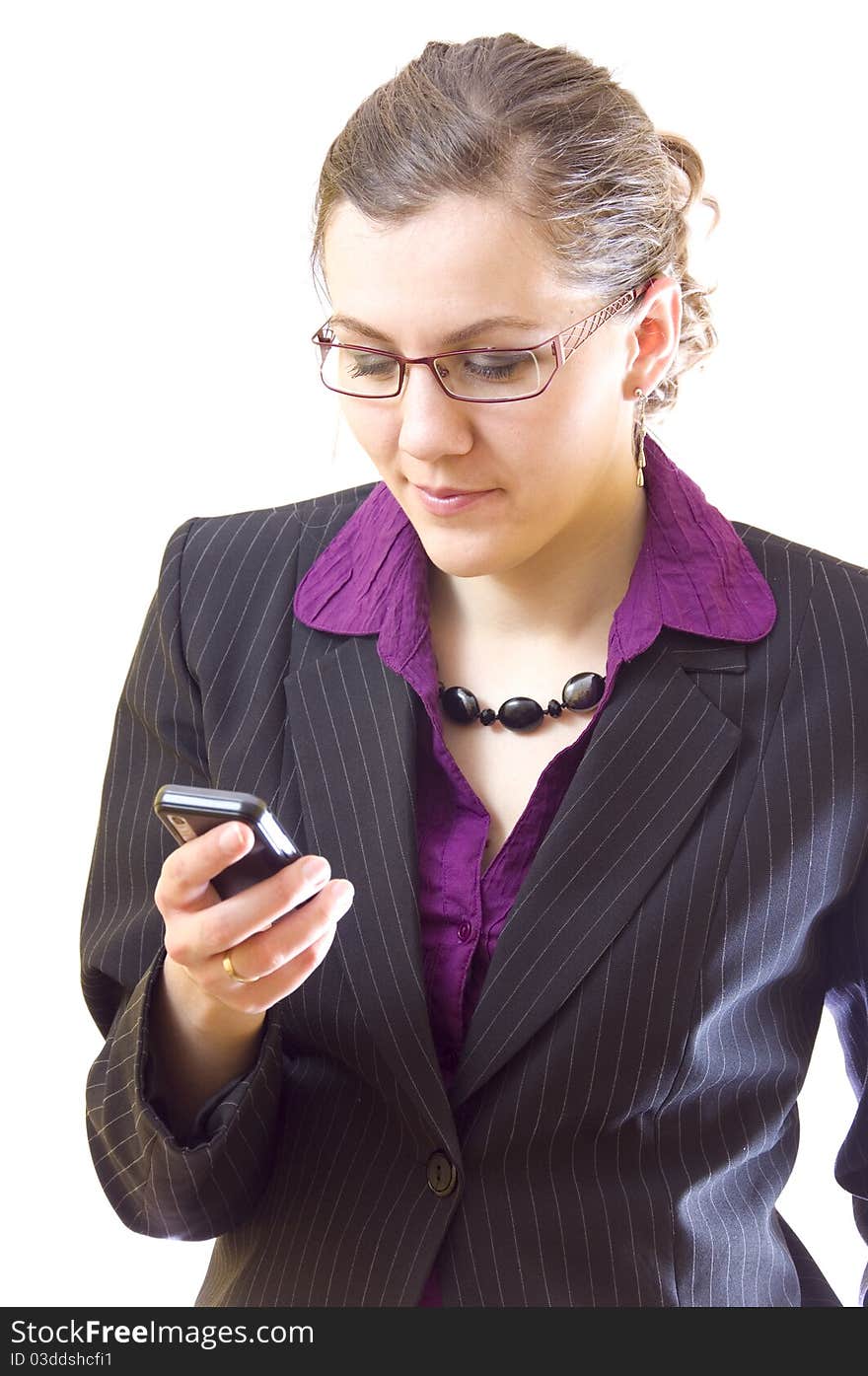 Young woman using cellphone, on white background. Young woman using cellphone, on white background