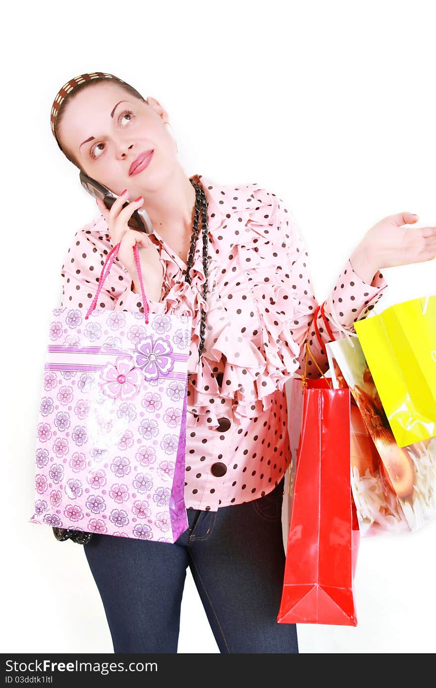 Woman with purchases on a white background