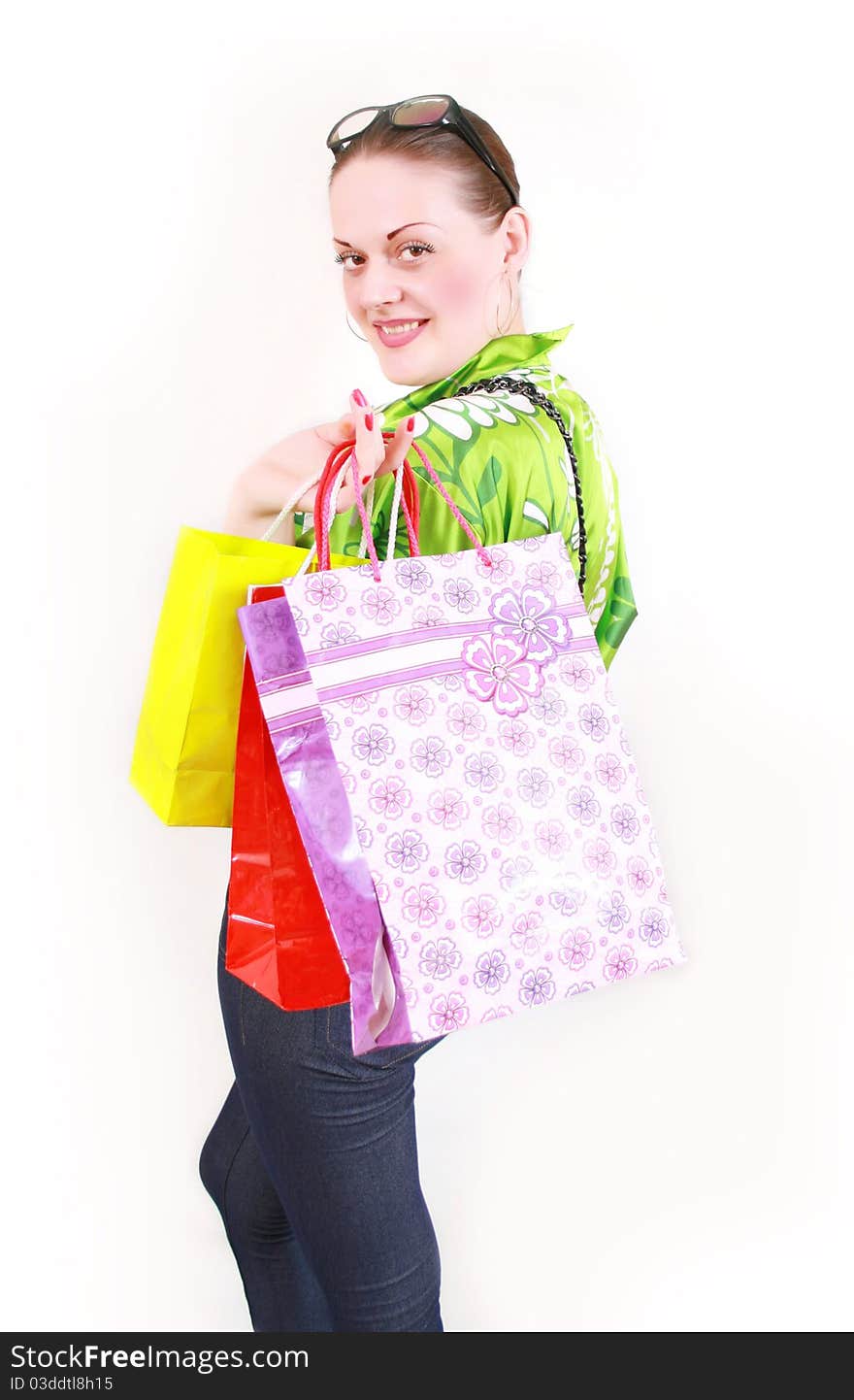 Woman with purchases on a white background