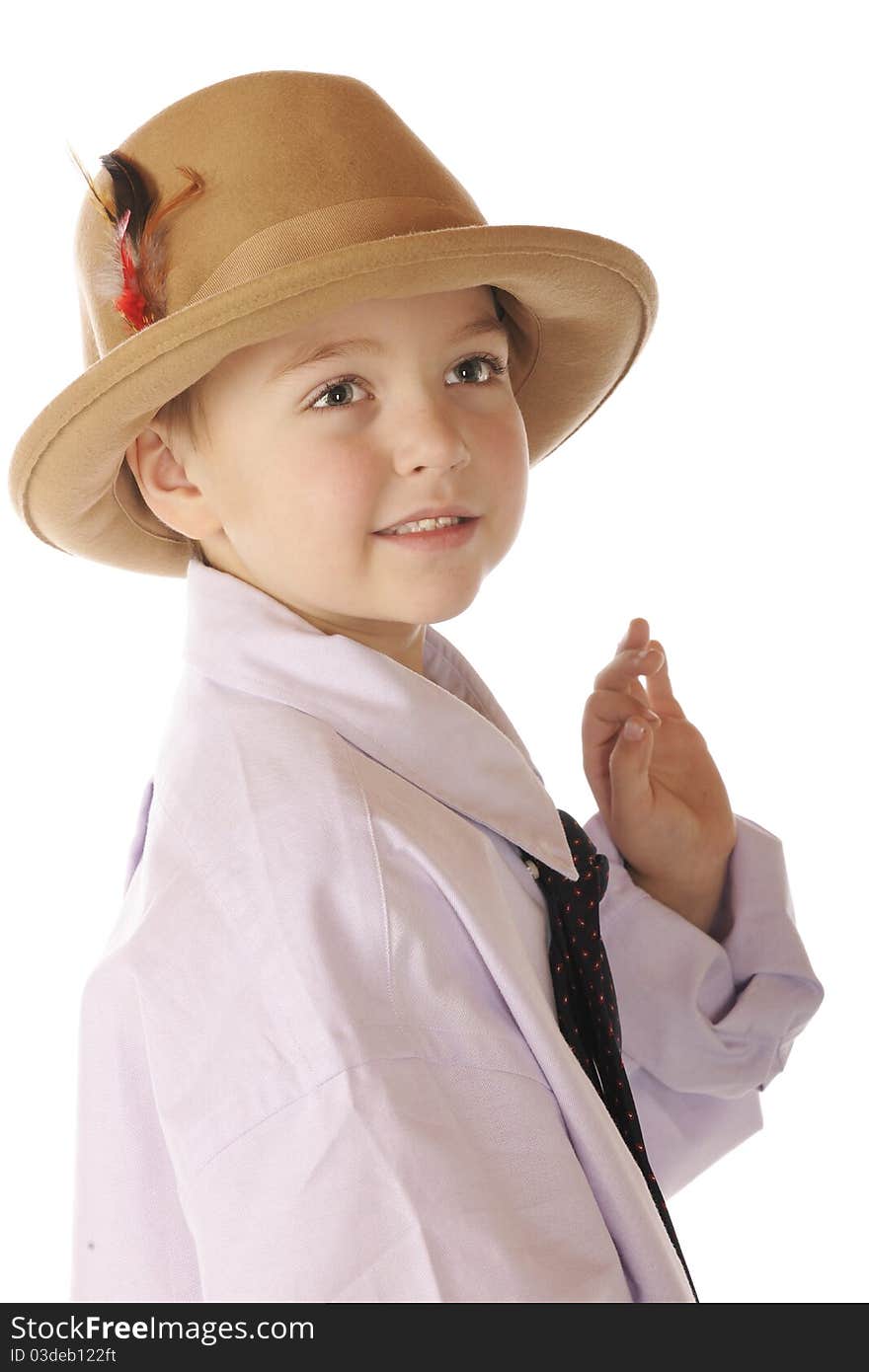 Head and shoulders portrait of a handsome kindergartner dressed in his grandpa's hat, shirt and tie. Isolated on white. Head and shoulders portrait of a handsome kindergartner dressed in his grandpa's hat, shirt and tie. Isolated on white.