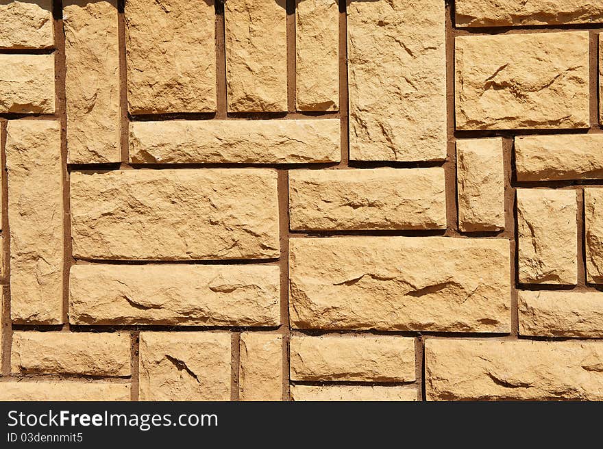 Wall of house  lined with stone tiles. Wall of house  lined with stone tiles