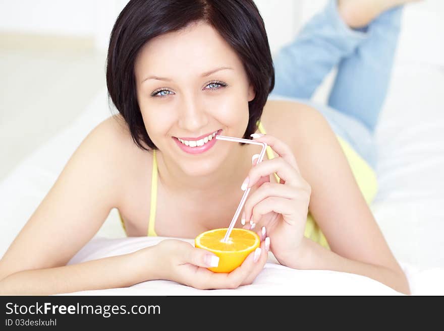 Girl with Orange on a light background