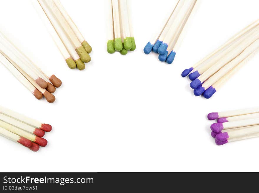 Many colored matches isolated on a white background