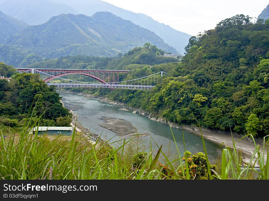 A suspension bridge across mountains