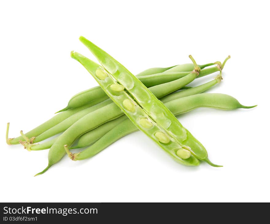 Fresh green peas on a white background