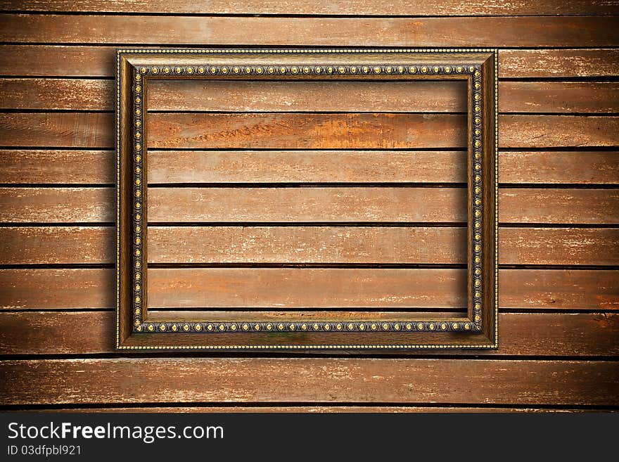 Photo frame on wood wall background