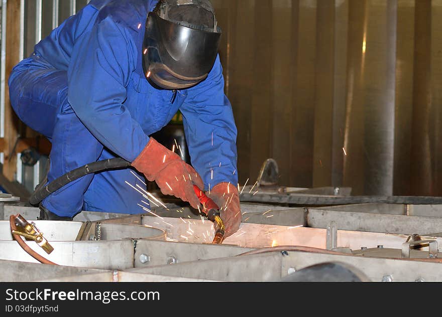 Welder working. Industrial photo.