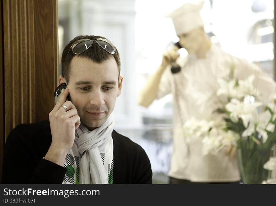 Portrait of happy smiling man, in bisness center