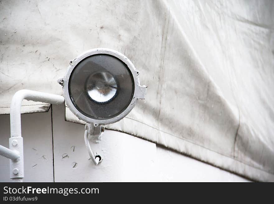 A spotlight attached to a boat