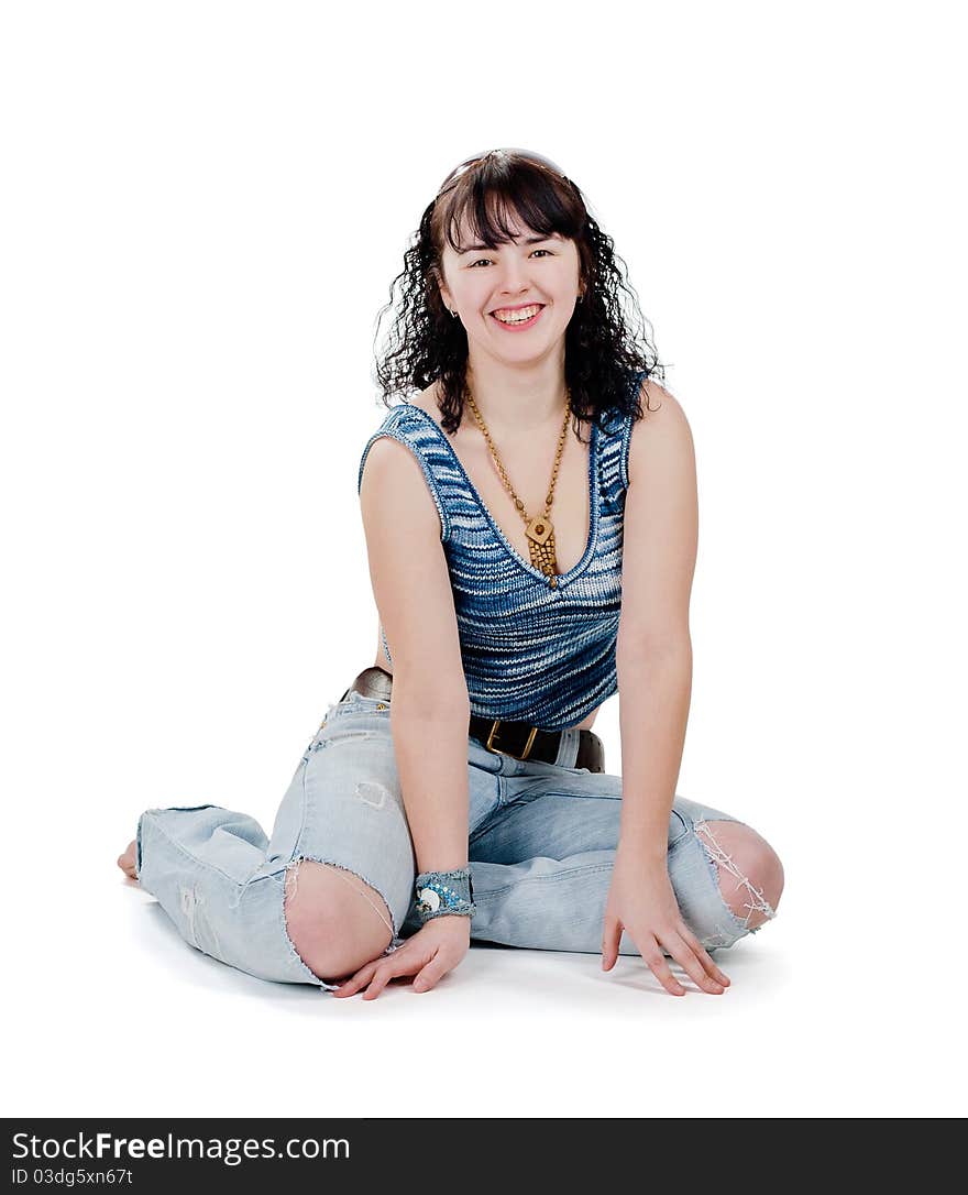 Portrait of smiling girl in torn jeans