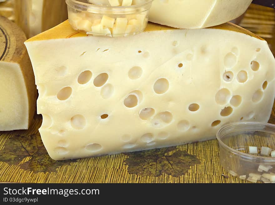 Cheese selling in a market, close up. Cheese selling in a market, close up