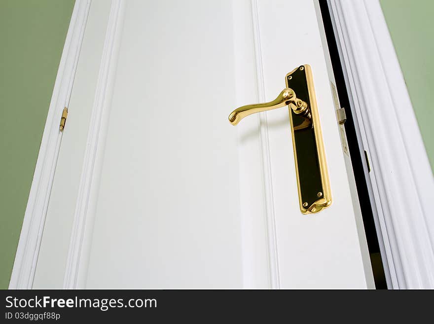 White open retro door with golden handle