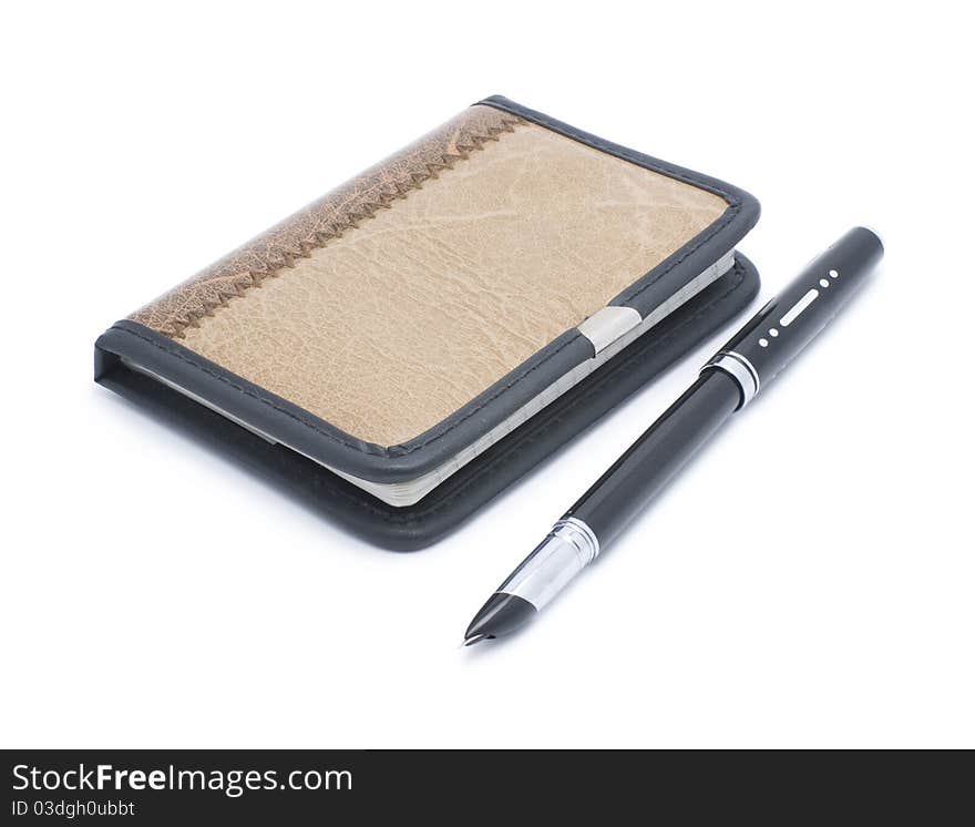 Picture of notebook and pen pen on a white background