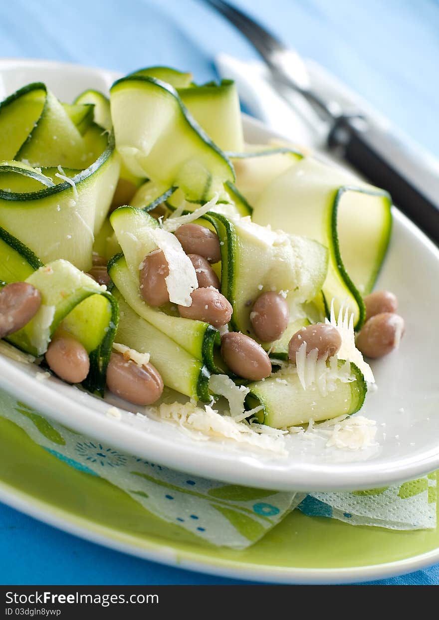 Bean and fresh zucchini appetizer with cheese