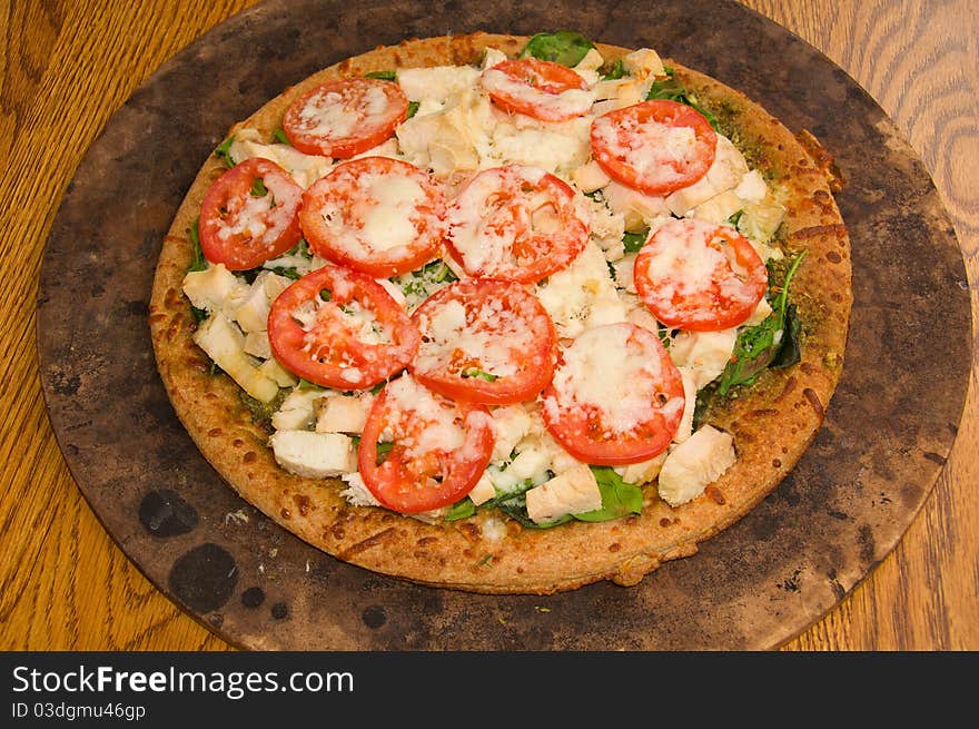 Pesto Spinach Tomato Pizza