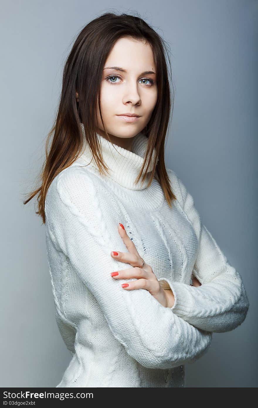 Portrait of a beautiful female model on white background