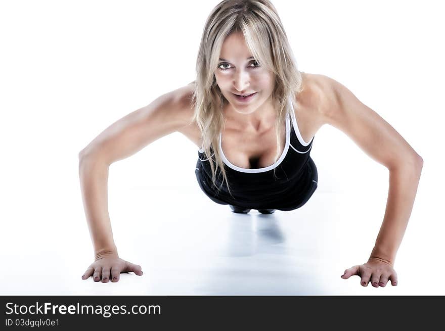 Smiling healthy woman working out. Smiling healthy woman working out