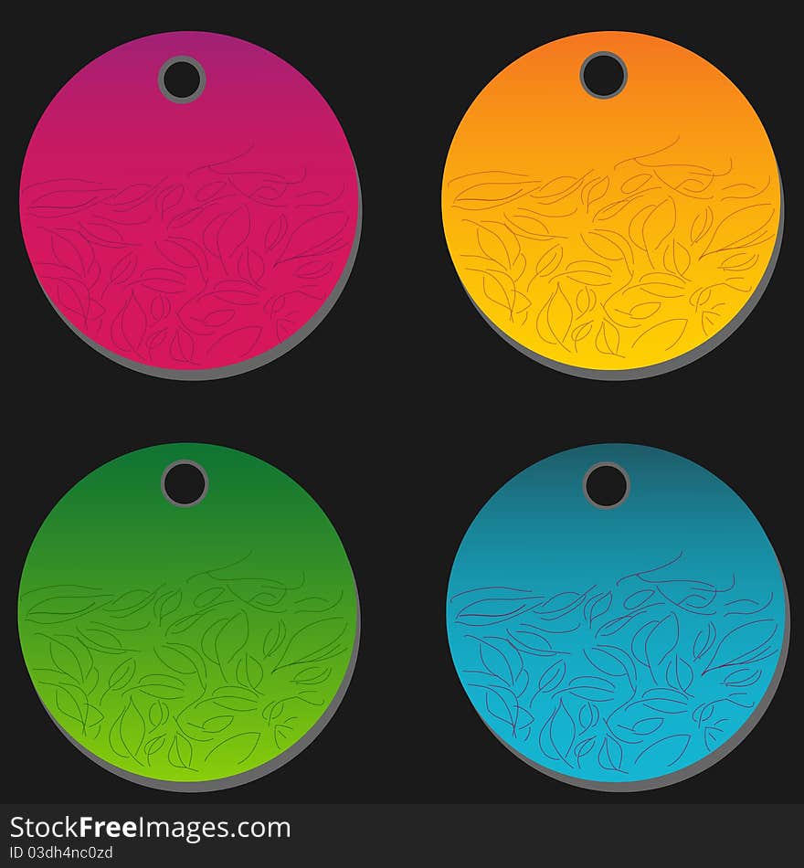 Set of four tags in different colors on gray