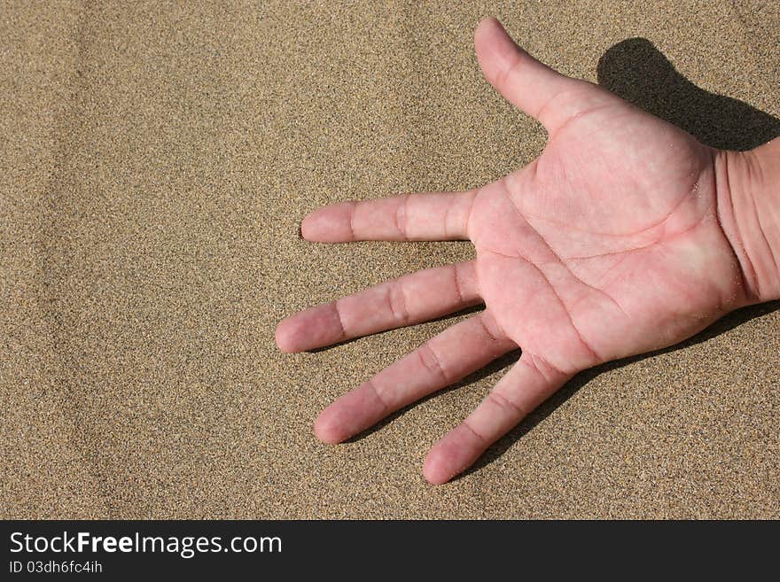 Hand in the Sand