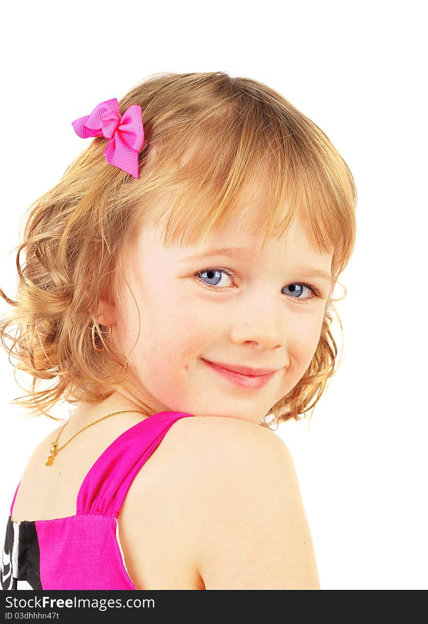 Portrait of a happy little girl on the white background.