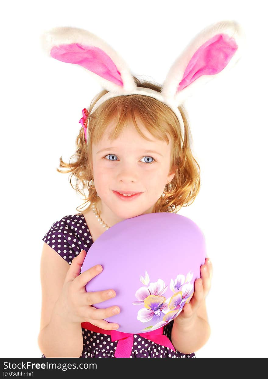 Portrait of a happy little rabbit girl with big Easter egg isolated on the white background. Portrait of a happy little rabbit girl with big Easter egg isolated on the white background.