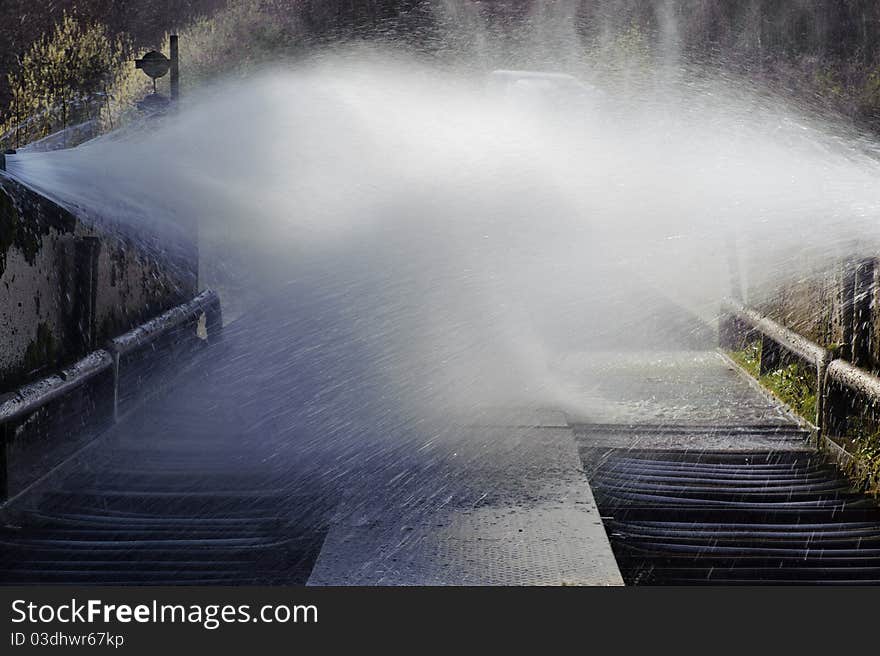 Water nozzles in a wash for trucks