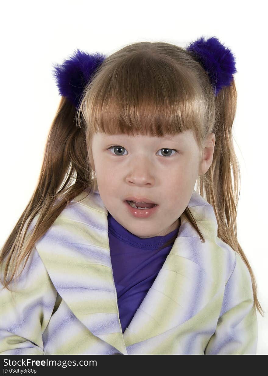 Portrait of the cheerful little girl on a white background