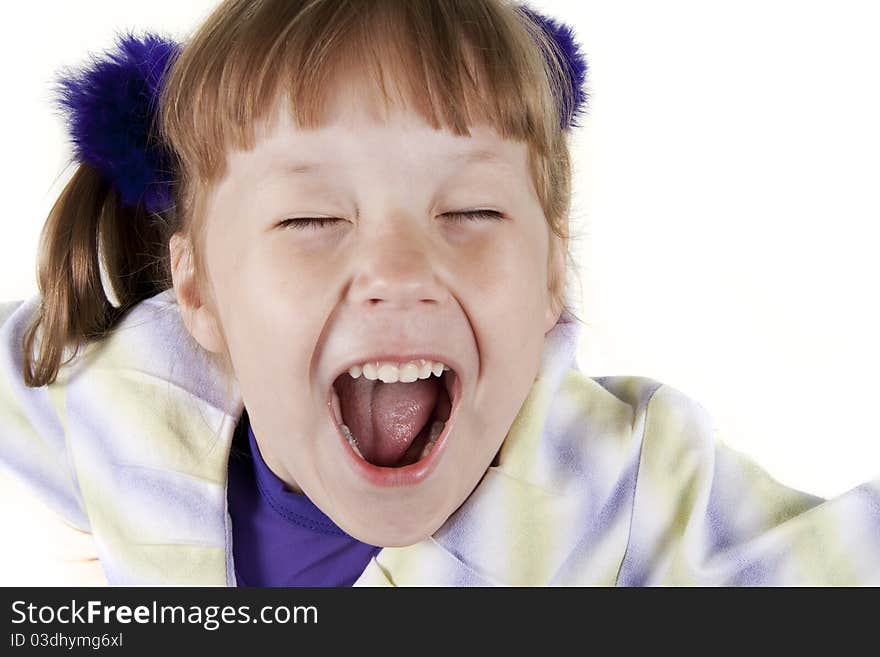 Portrait of the cheerful little girl on a white background