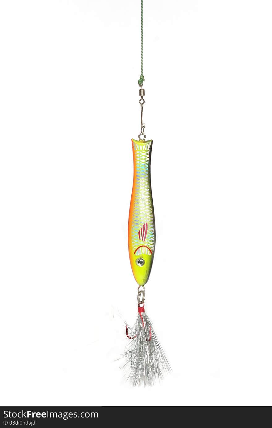 Metal angling bait on white background