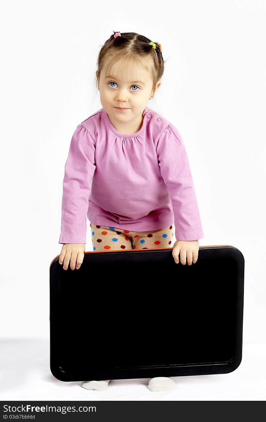 The playing child on the isolated white background