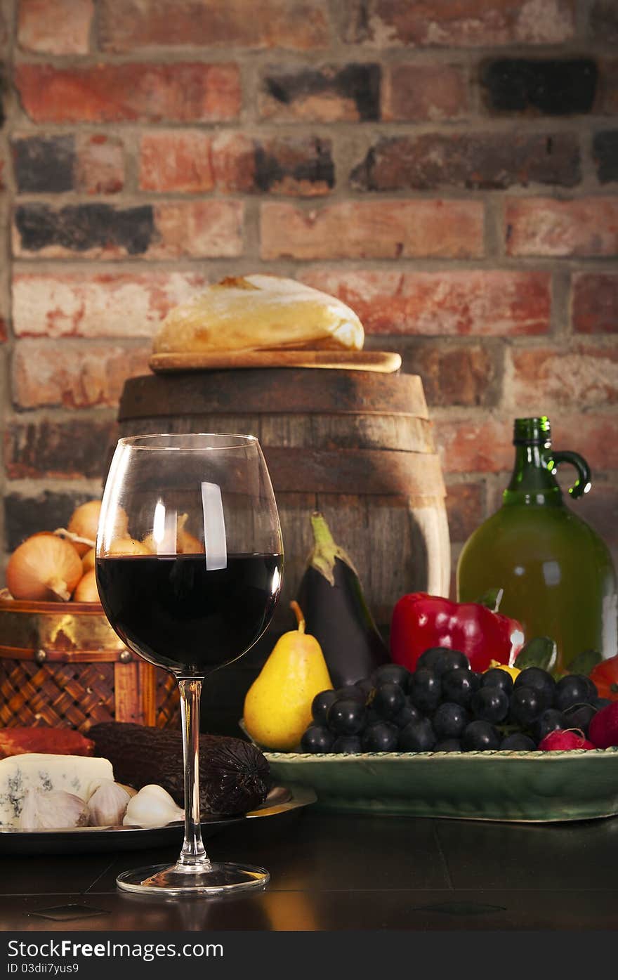 Still life with wine and some fruits,vegetables