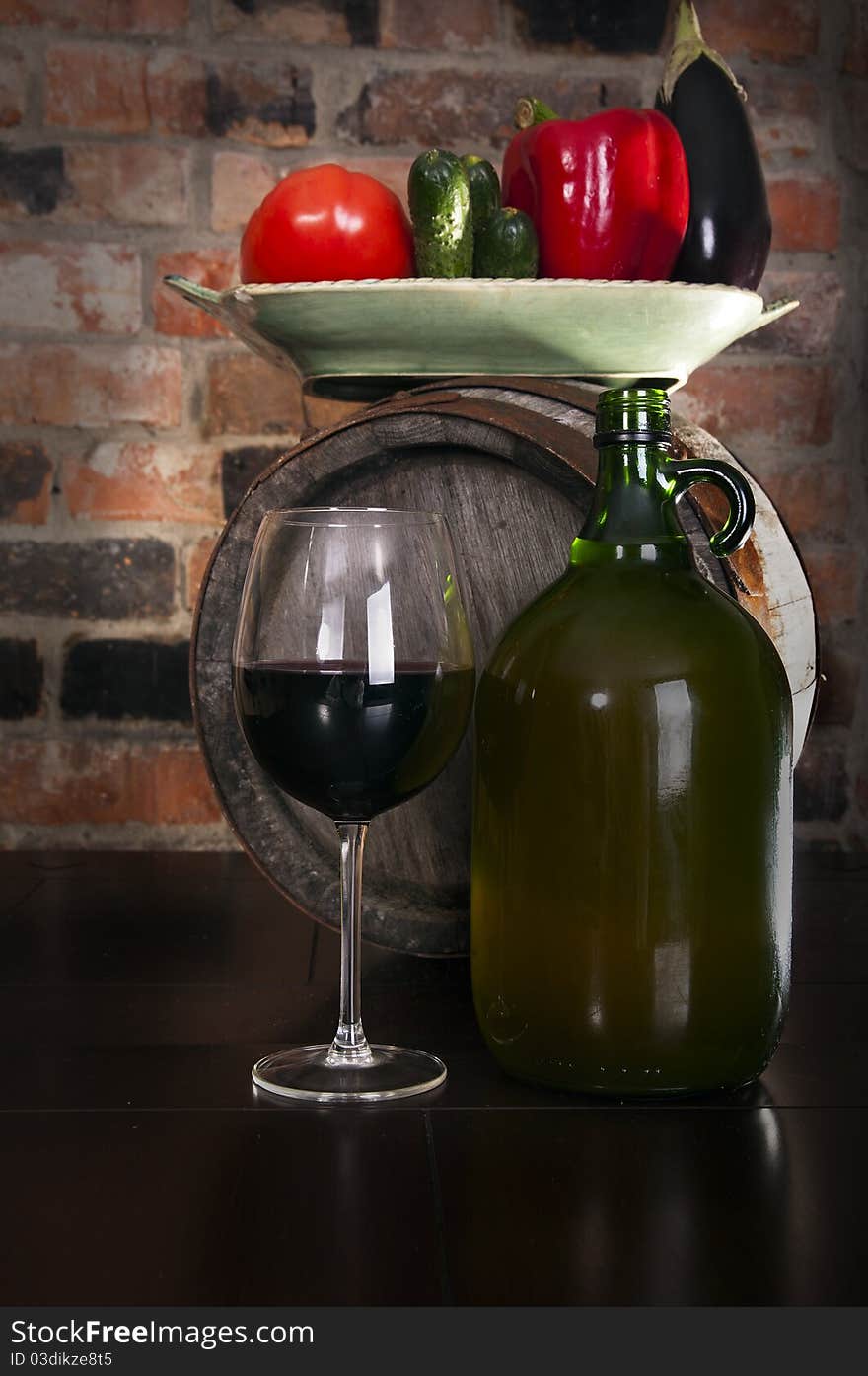 Still life with wine and some vegetables