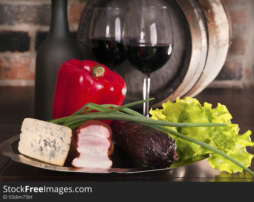 cheese and ham. Against the backdrop of a brick wall. cheese and ham. Against the backdrop of a brick wall.