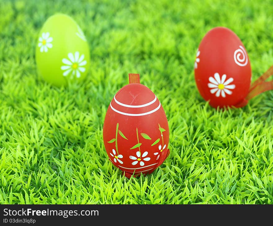 Colorful Easter eggs on the grass