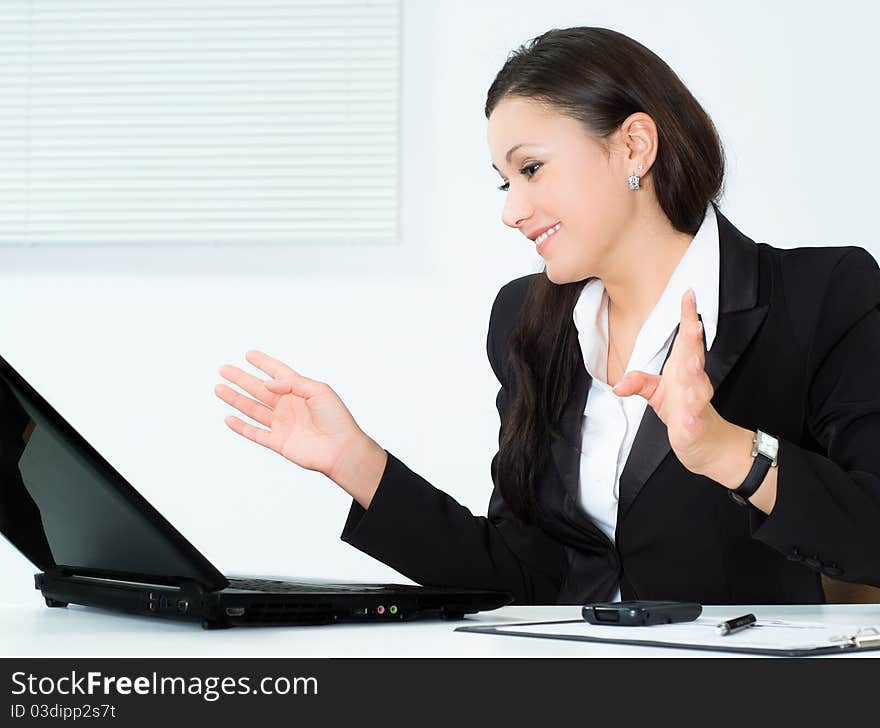 Girl in a business suit working