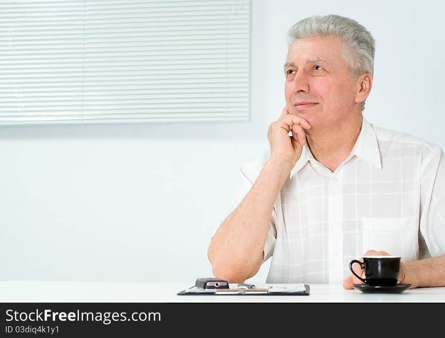 Portrait of a happy man on a white