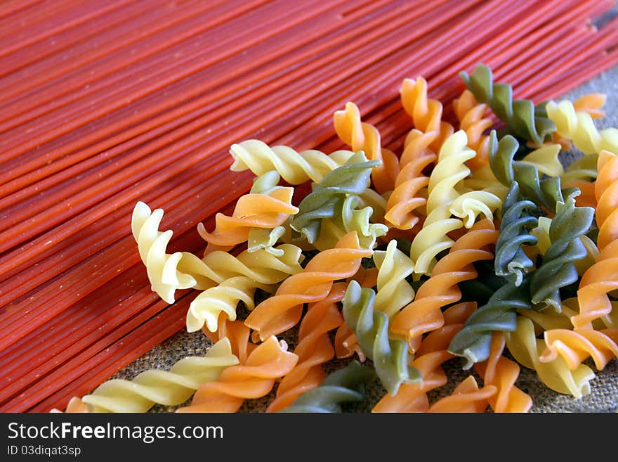 Various types of pasta - spachetti, fusilli. Various types of pasta - spachetti, fusilli