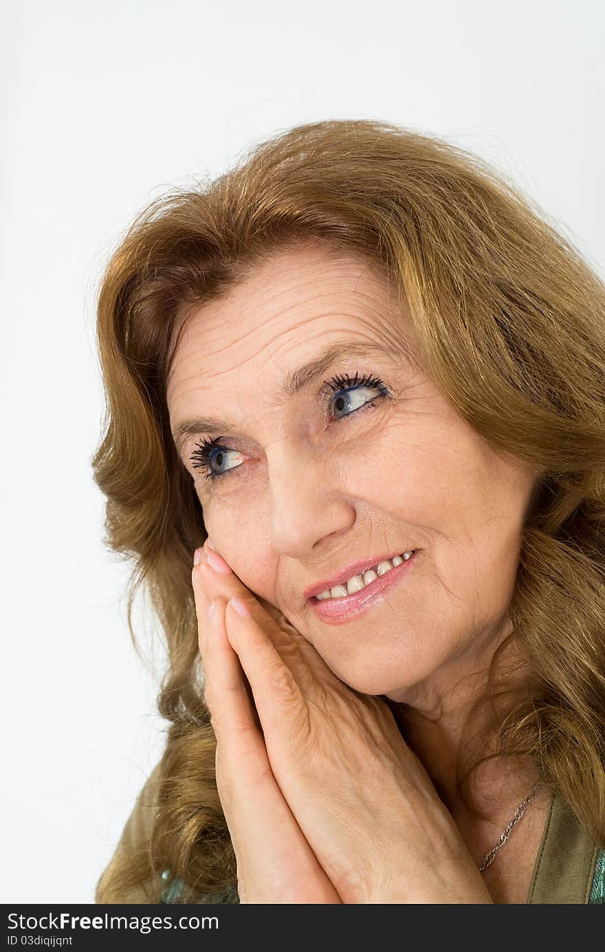 Nice elderly woman on a blue background