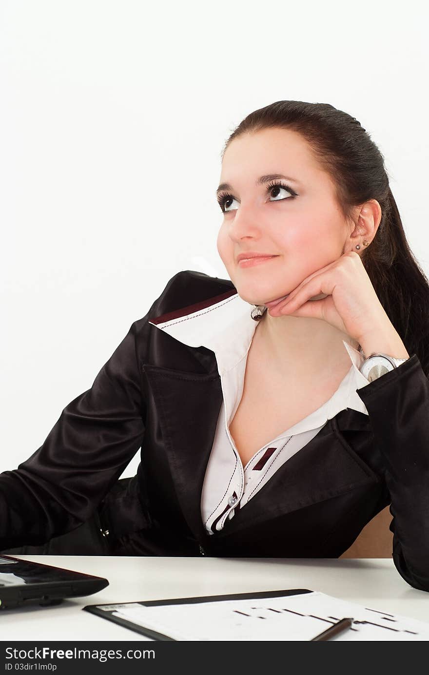 Beautiful woman in a black business suit with a white