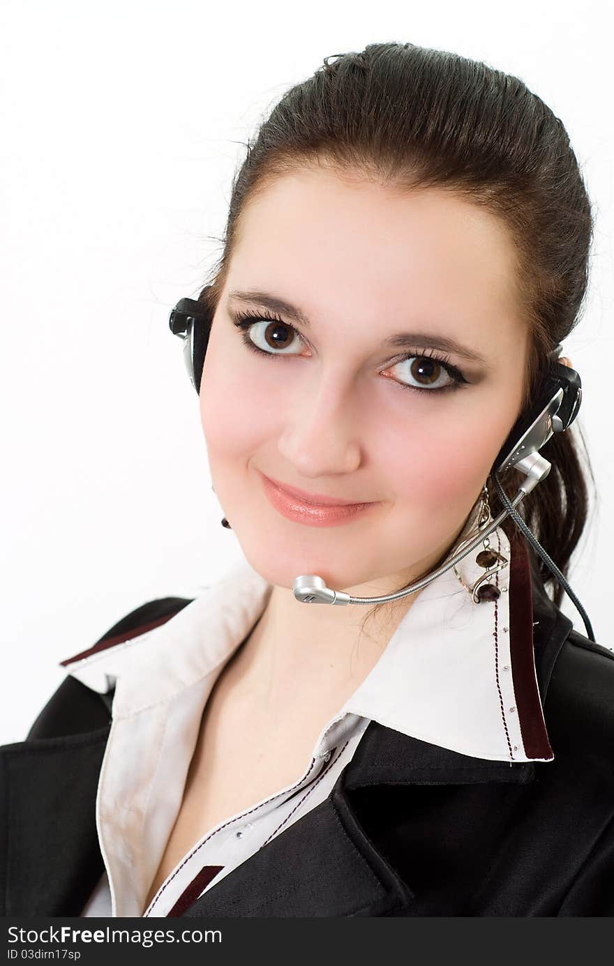 Beautiful girl in a black business suit with a white background