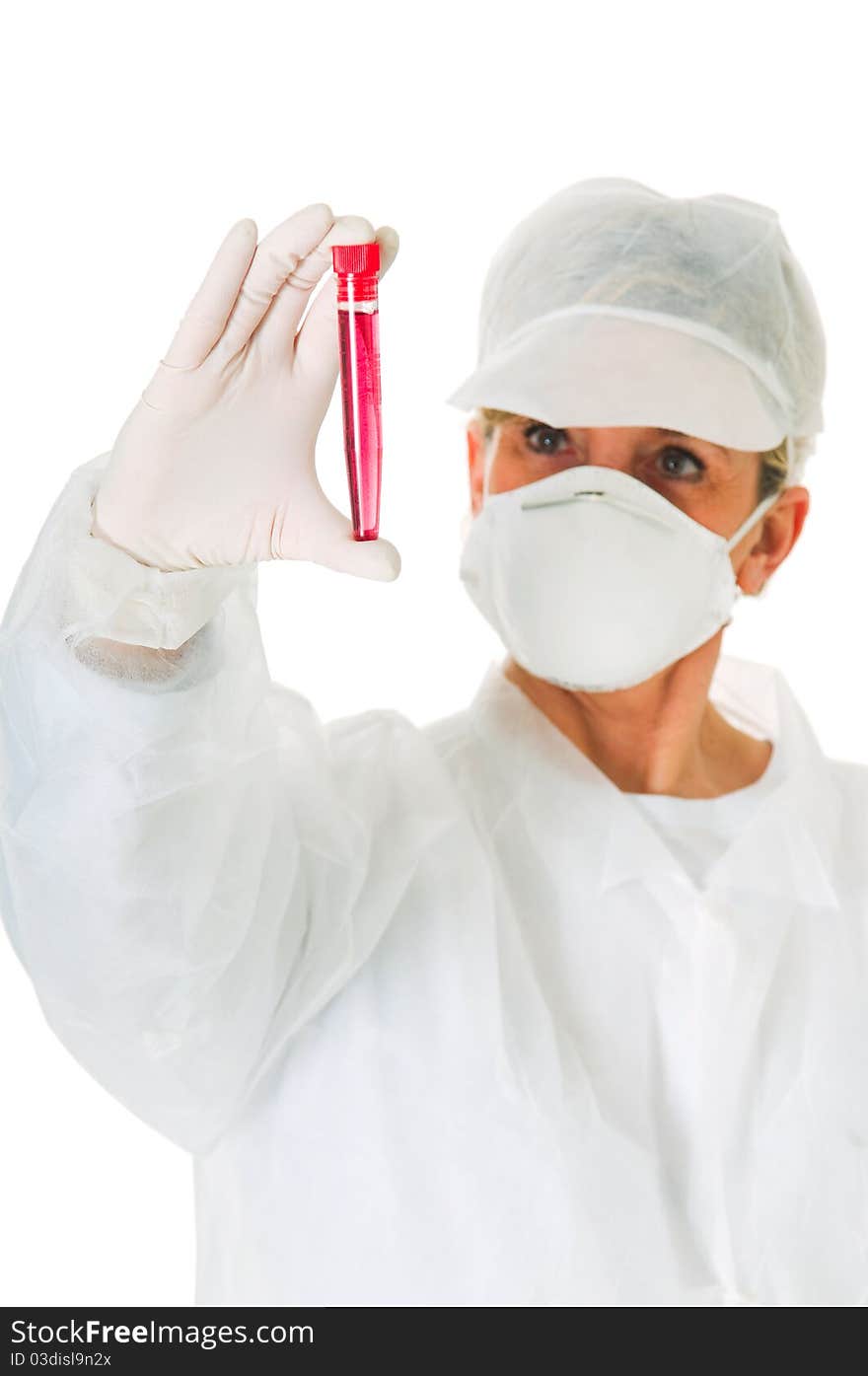 Female doctor with mask holding a test tube in white background