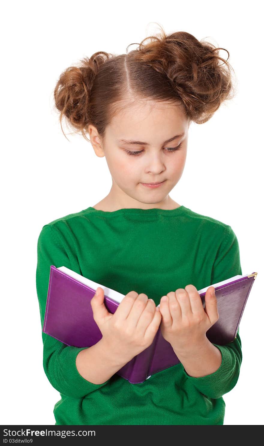 Interested girl reading book; isolated