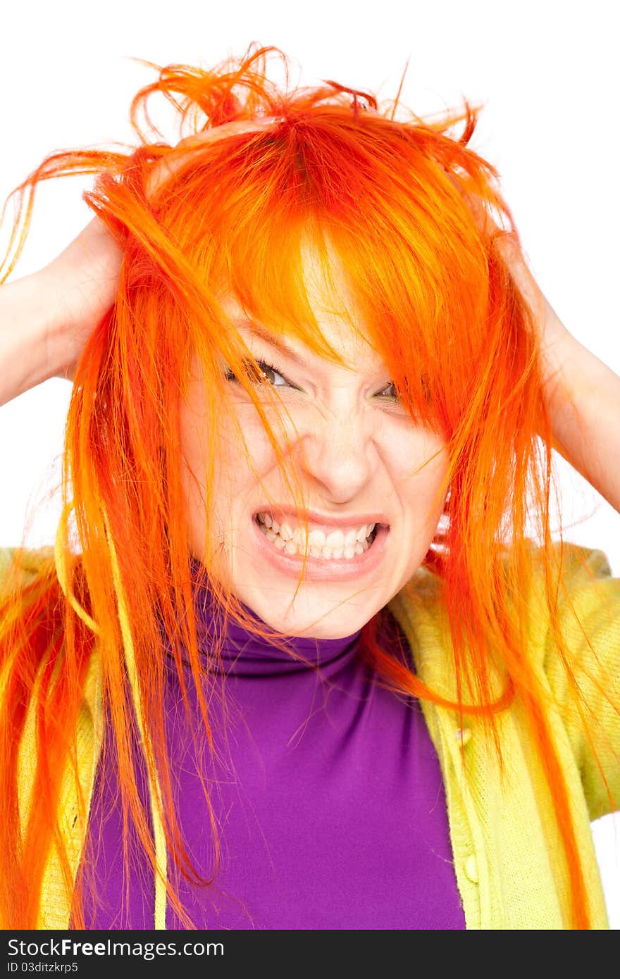 Angry woman holding red head with hands show teeth